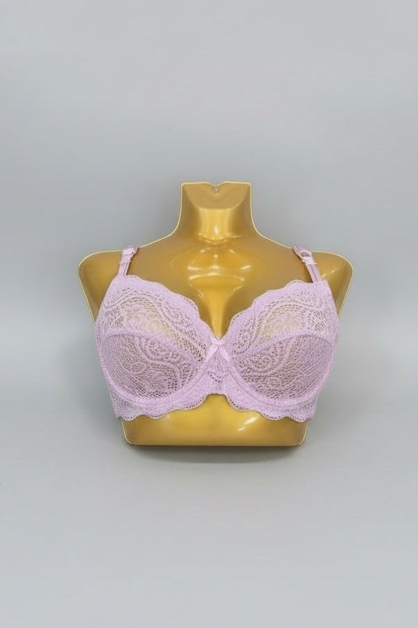 Lace bra on a mannequin bust with gray background